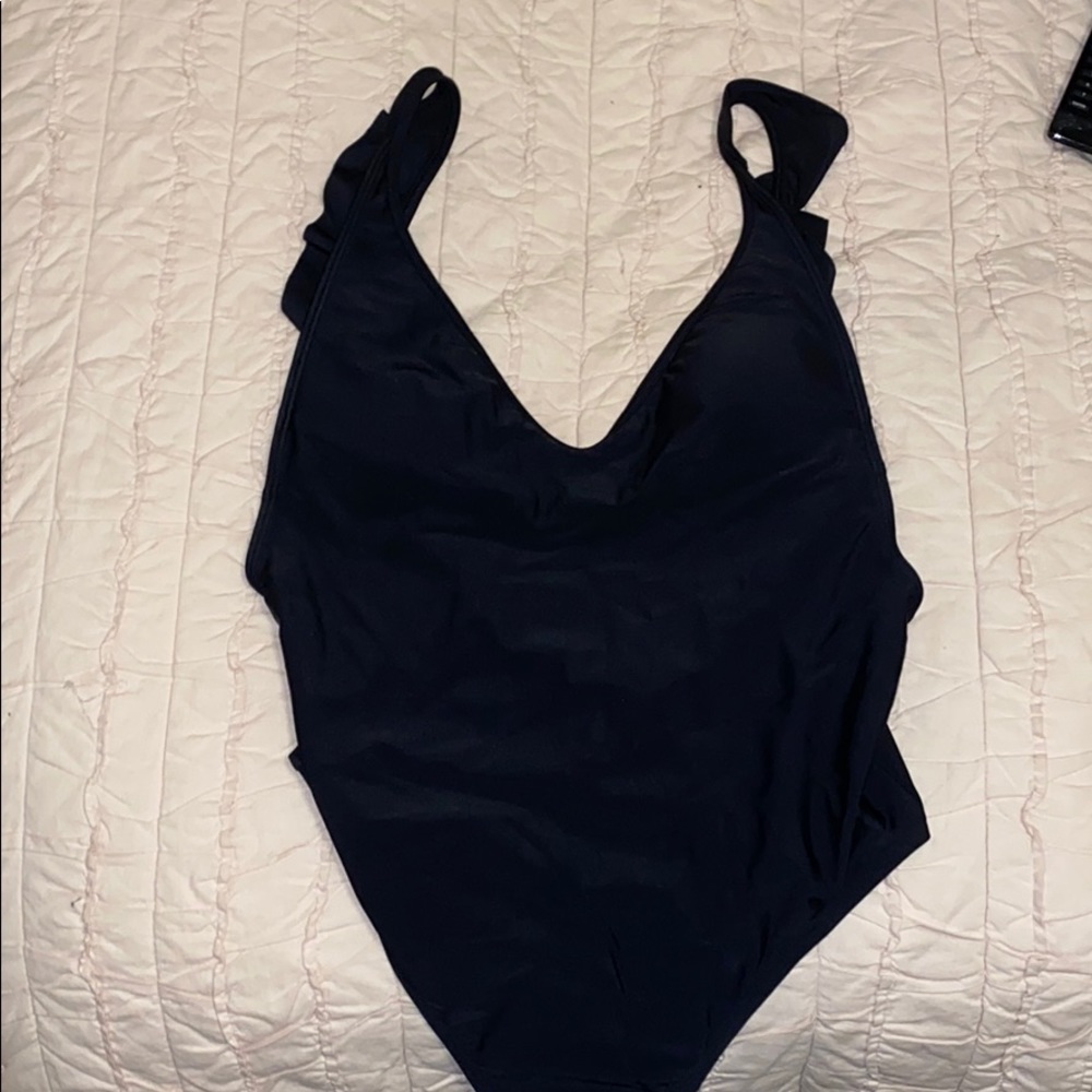 One piece low bag scoop sides ruffle bathing suit